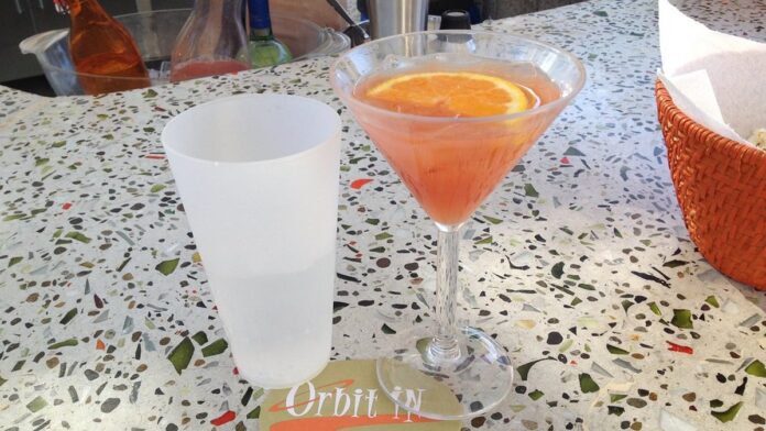 Interface de desktop Linux exibida em uma janela flutuante sobre um sistema operacional com ícones e barras de tarefas.