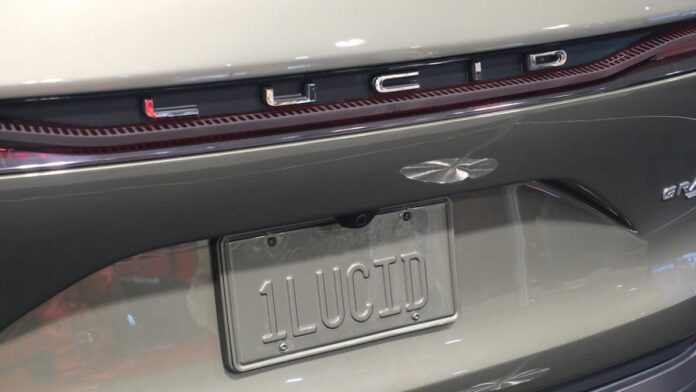 A close up of a license plate on a car