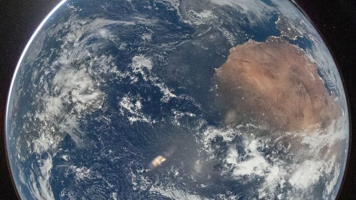 A view of Earth taken by NASA astronaut and Artemis II Commander Reid Wiseman from of the Orion spacecraft's window after com