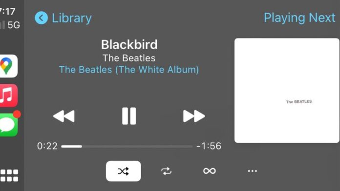 s4-268859dfc596 'Now Playing' interface through Apple Music on Apple CarPlay.