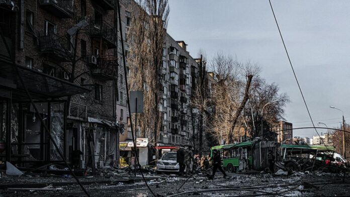 A war-damaged street in Kyiv, Ukraine, showing destruction and chaos.