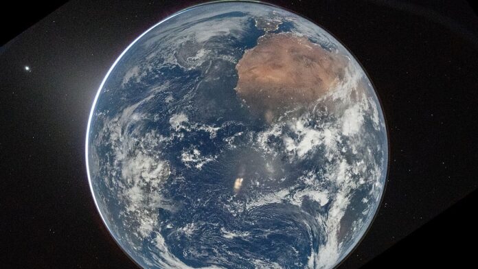 A view of Earth taken by NASA astronaut and Artemis II Commander Reid Wiseman from of the Orion spacecraft's window after com