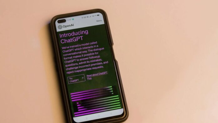 Smartphone screen showing ChatGPT introduction by OpenAI, showcasing AI technology.
