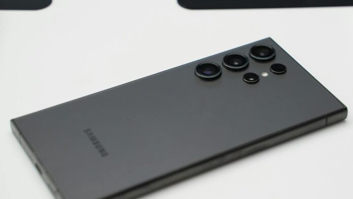 Detailed close-up shot of a sleek Samsung smartphone highlighting its advanced camera lenses.