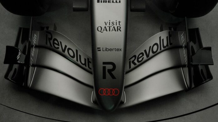 Close-up of a silver formula 1 car nose cone.