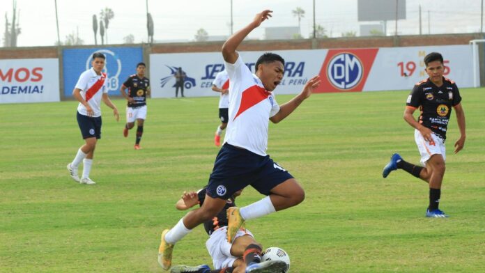 Intense soccer match capture with players mid-action on the field.