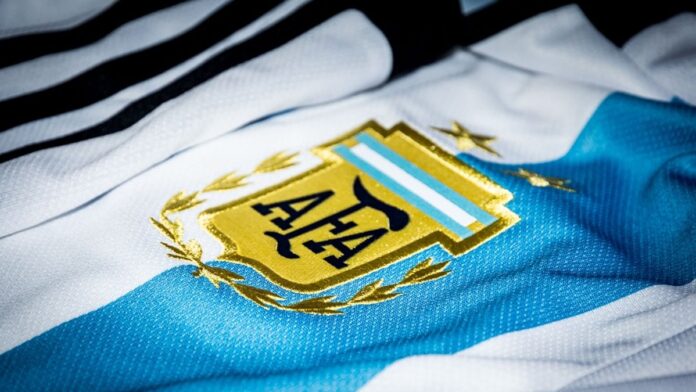 a close up of a jersey with a blue and white stripe