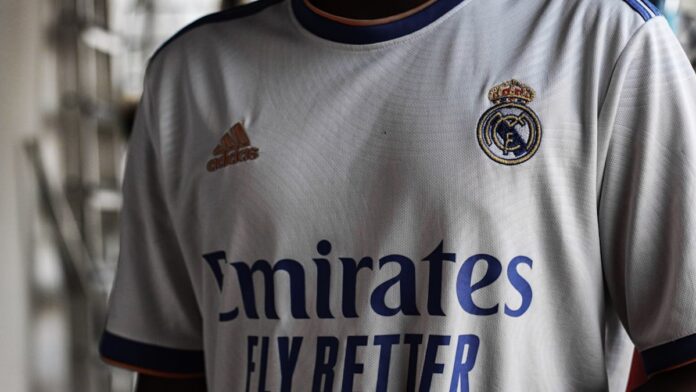 a close up of a soccer jersey on a person