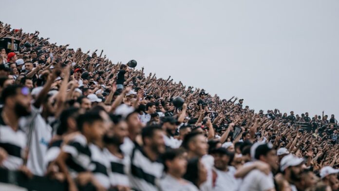 A large crowd of people at a sporting event