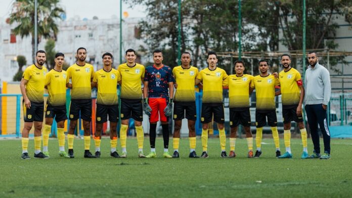 s4-e43b3c476e87 A soccer team poses for a photo.