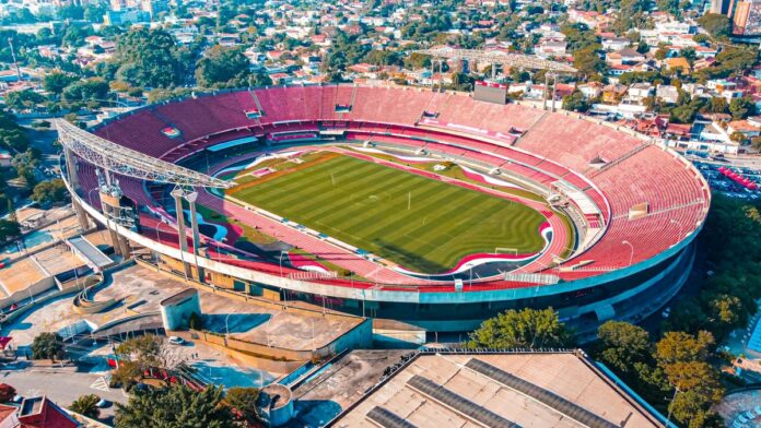 s4-fb798ca07cc6-23 Aerial shot of the iconic Morumbi Stadium in São Paulo, Brazil, bathed in daylight.
